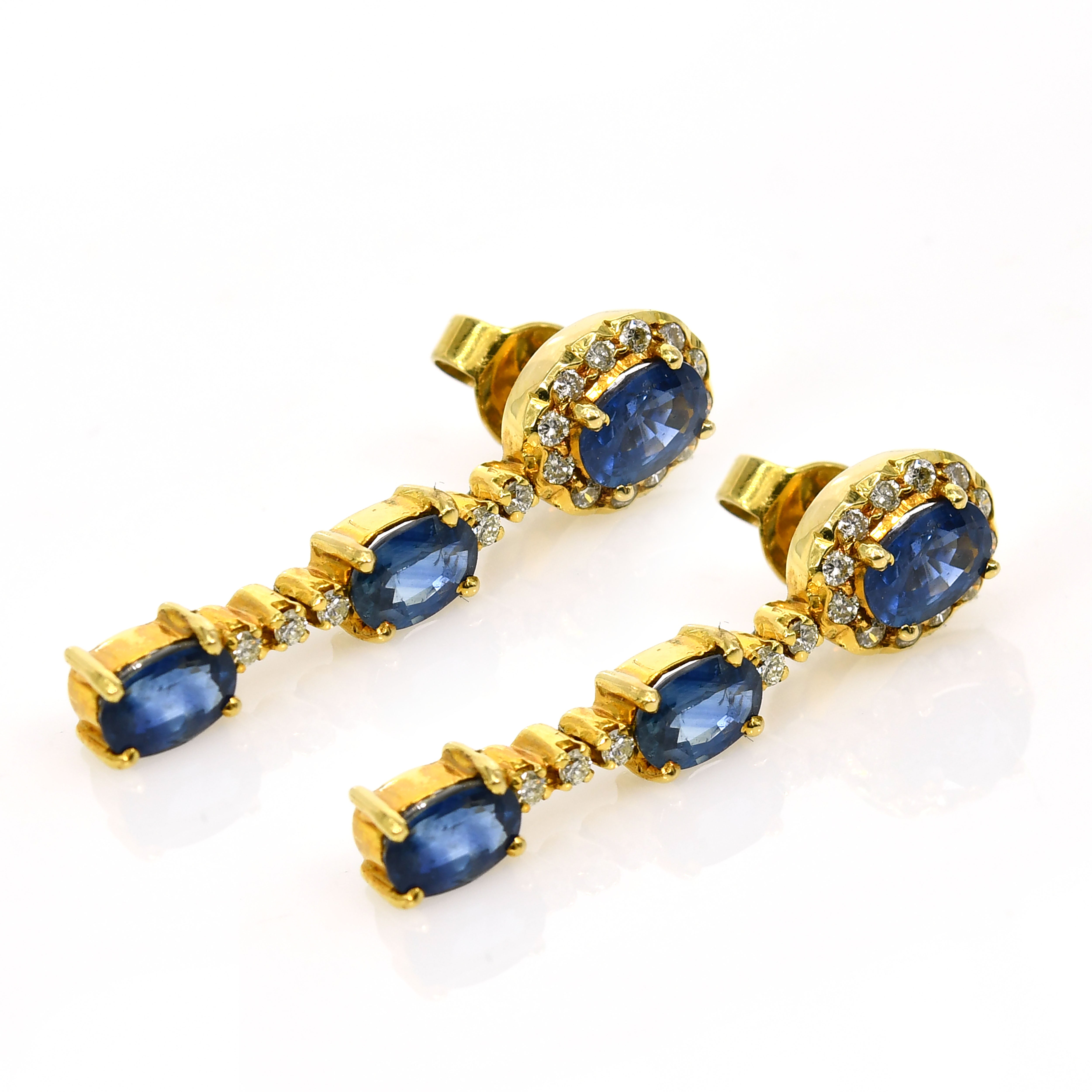 18k White Gold 6.49ct Oval Blue Sapphire & Diamond Halo Earrings